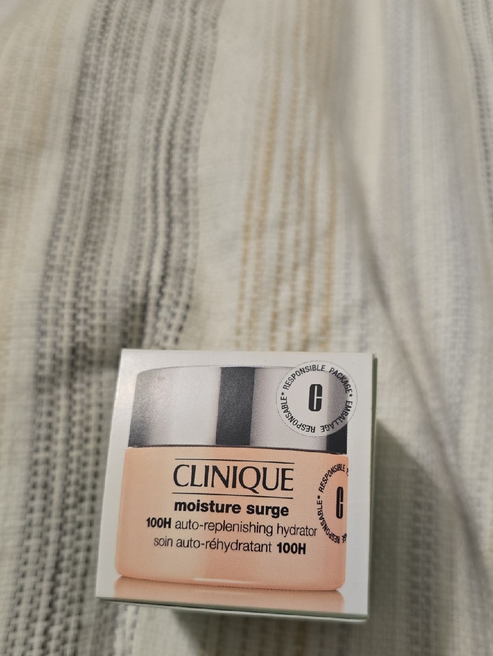 Clinique Moisture Surge Jar in Peach and White Packaging